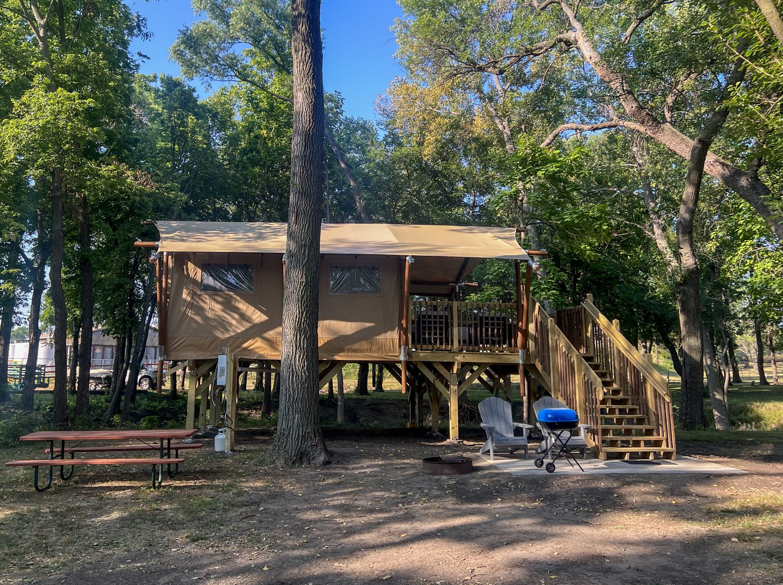 Safari Cantina Luxury Glamping Tents outdoor view on sunny day.